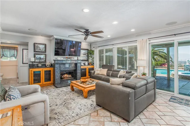 a kitchen with stainless steel appliances kitchen island granite countertop a stove a sink and a refrigerator