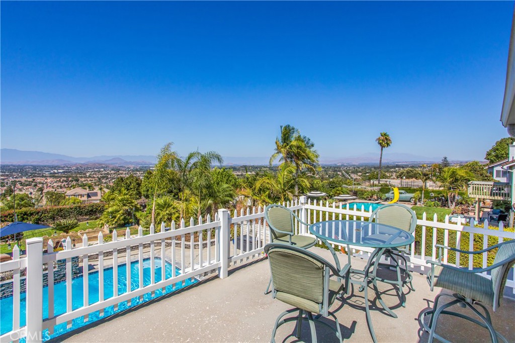 16455 Lake Knoll Parkway Riverside, CA 92503 - Photo 23 of 59 a view of a chairs and table in patio