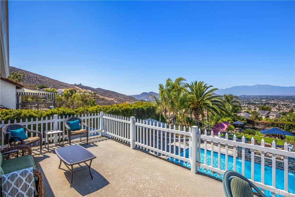 16455 Lake Knoll Parkway Riverside, CA 92503 - Photo 24 of 59 a view of a chairs and table in patio