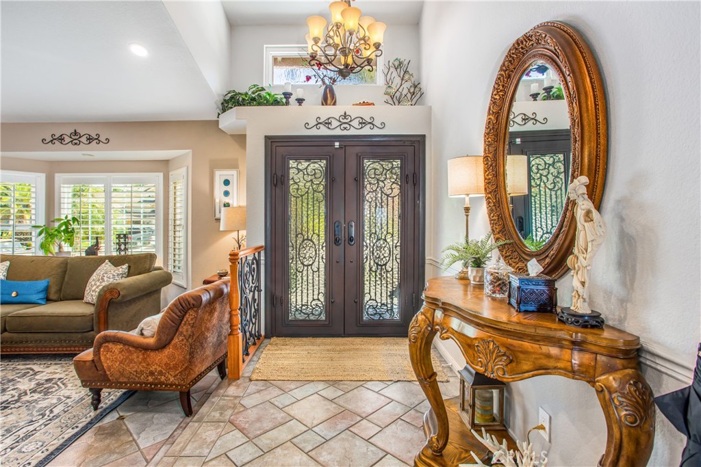 16455 Lake Knoll Parkway Riverside, CA 92503 - Photo 3 of 59 a living room with furniture and a large window
