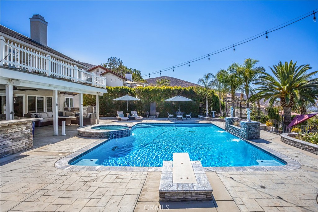 16455 Lake Knoll Parkway Riverside, CA 92503 - Photo 40 of 59 a view of a swimming pool with sitting area