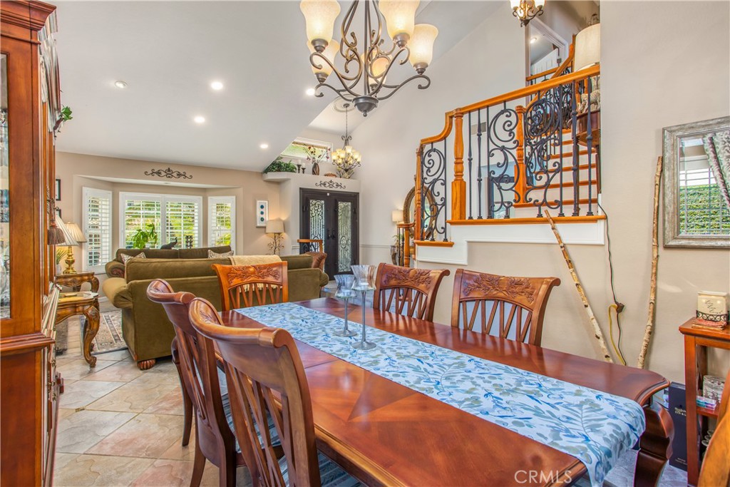 16455 Lake Knoll Parkway Riverside, CA 92503 - Photo 9 of 59 a view of a dining room with furniture window and wooden floor