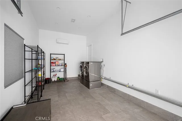 a view of empty room with staircase and closet