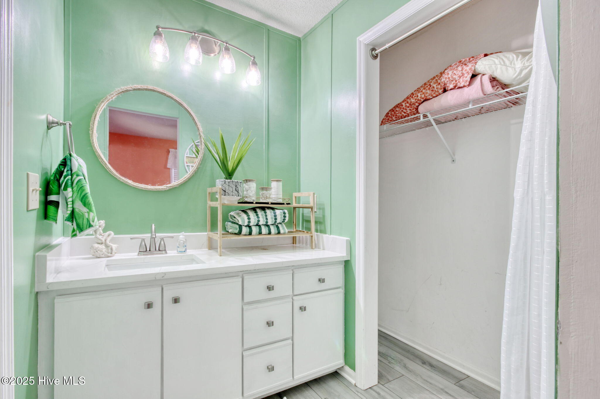 223 Clubhouse Road, Unit 5 Sunset Beach, NC 28468 - Photo 14 of 35 Updated Bath with Quartz Countertops and new sink and fixtures