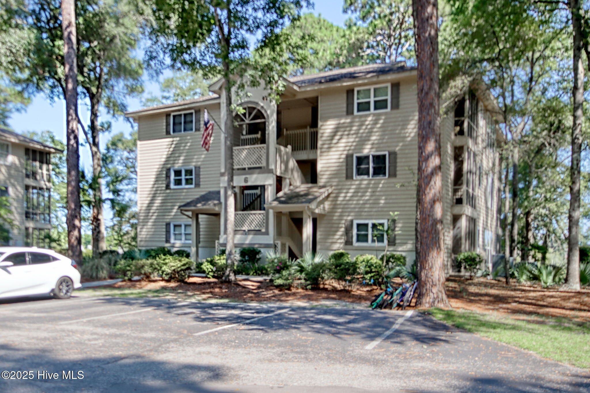 223 Clubhouse Road, Unit 5 Sunset Beach, NC 28468 - Photo 2 of 35 Great location within Sea Trail. Top Floor Condo!