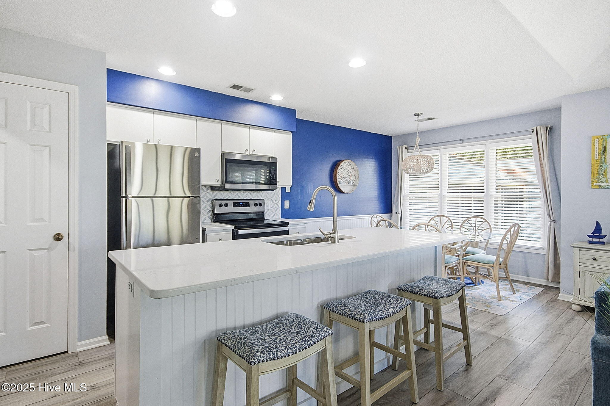 223 Clubhouse Road, Unit 5 Sunset Beach, NC 28468 - Photo 5 of 35 Kitchen is open to the living room!