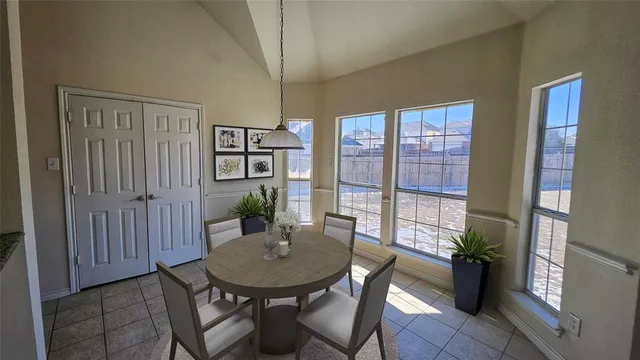 a view of a livingroom with furniture and window