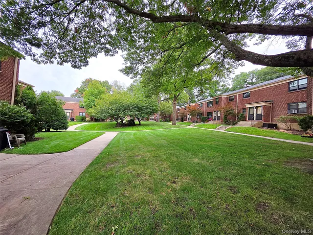 a view of yard with house and green space