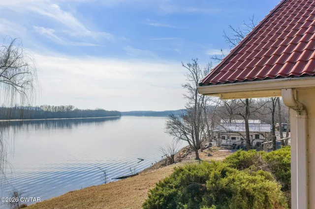 a view of a lake from a balcony
