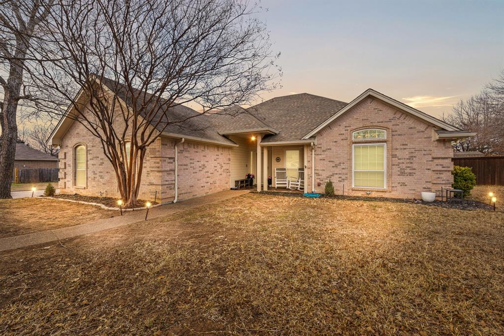 201 Brianne Street Joshua, TX 76058 - Photo 1 of 1 a view of a house with a yard and garage