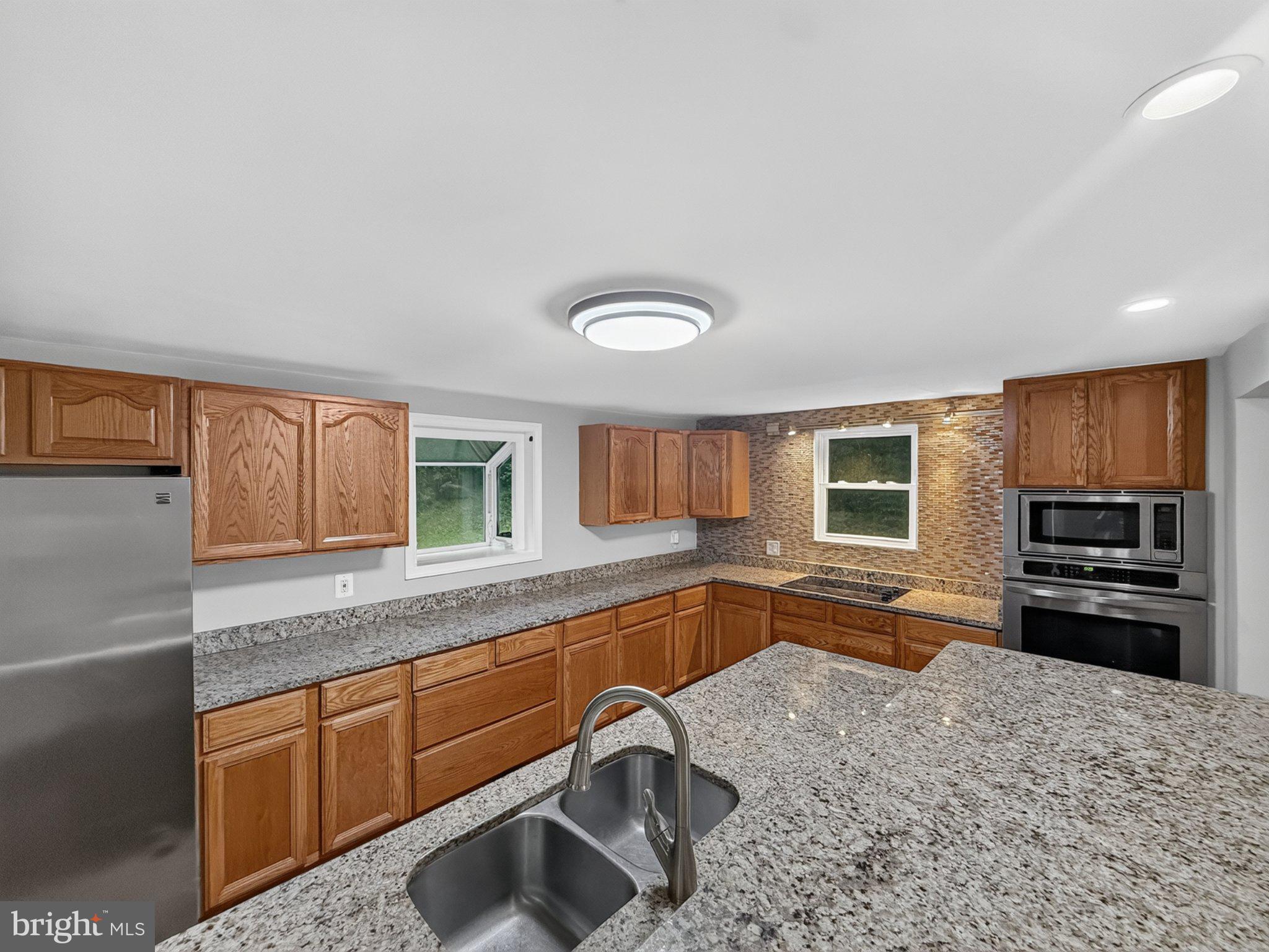 6117 Towles Mill Road Partlow, VA 22534 - Photo 13 of 30 Modern kitchen with elegant finishes.