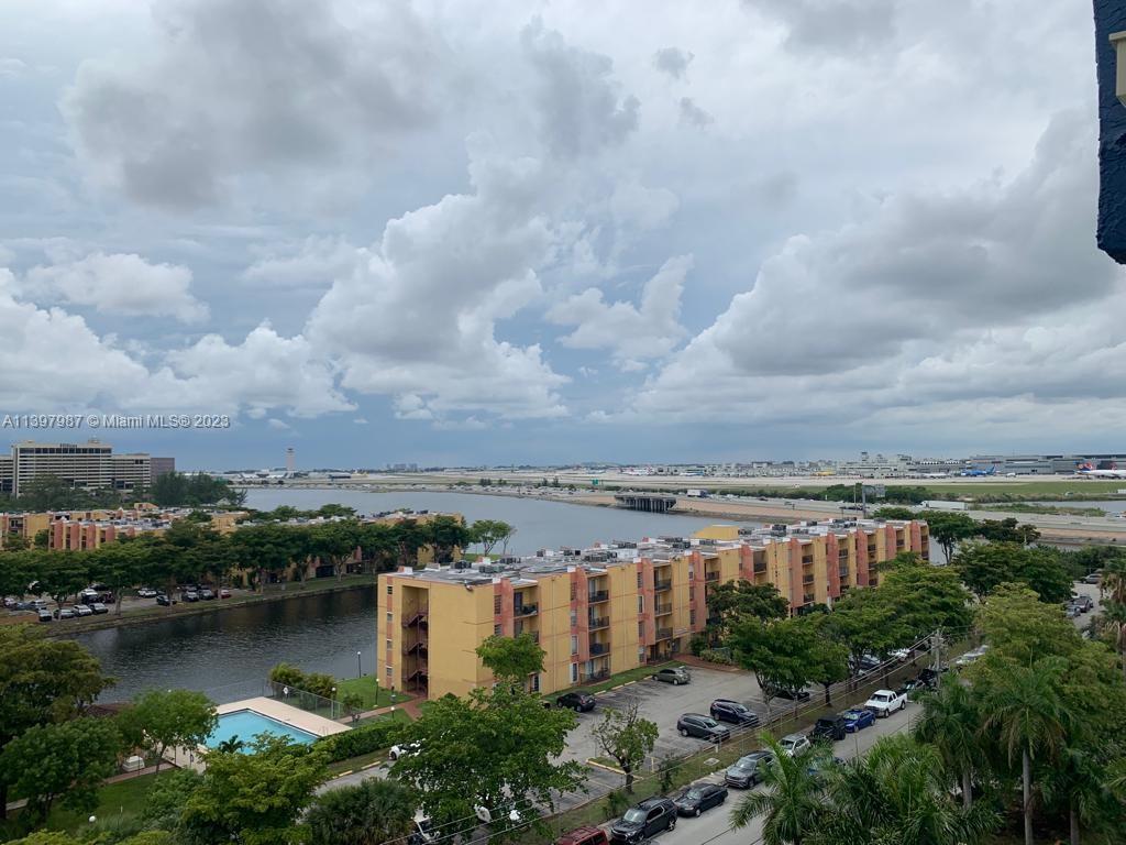 Yolanda Villas Condominiums Miami, FL 33126 - Photo 2 of 10 an aerial view of a city with lots of residential buildings lake and ocean view