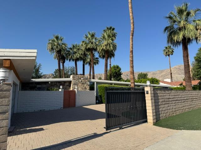 71279 Country Club Drive Rancho Mirage, CA 92270 - Photo 4 of 4 a view of a terrace with a garden