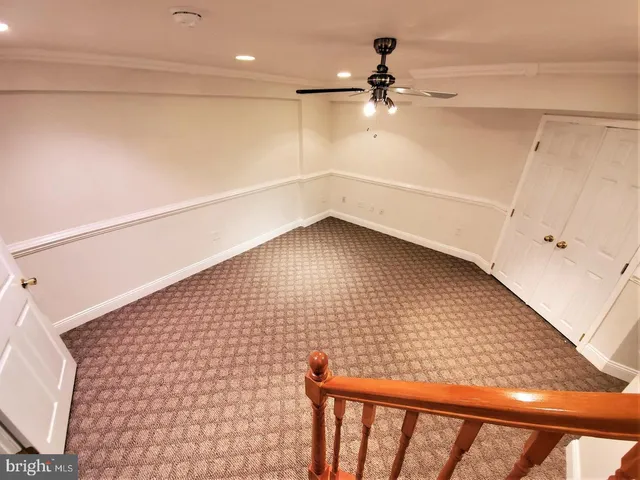 a view of an empty room and with a window