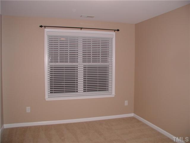 9222 Wooden Road Raleigh, NC 27617 - Photo 13 of 18 13'x10.2' Bedroom 3 with walk-in closet