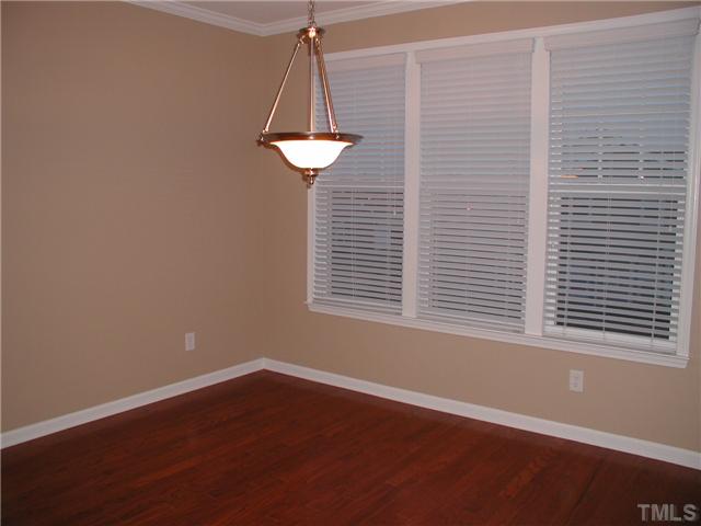 9222 Wooden Road Raleigh, NC 27617 - Photo 8 of 18 12'x10' Separate dining room with hardwood floors