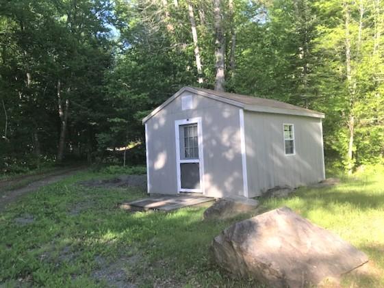 11 Thompson Road Sebec, ME 04481 - Photo 10 of 12 Cook Bunkhouse Exterior