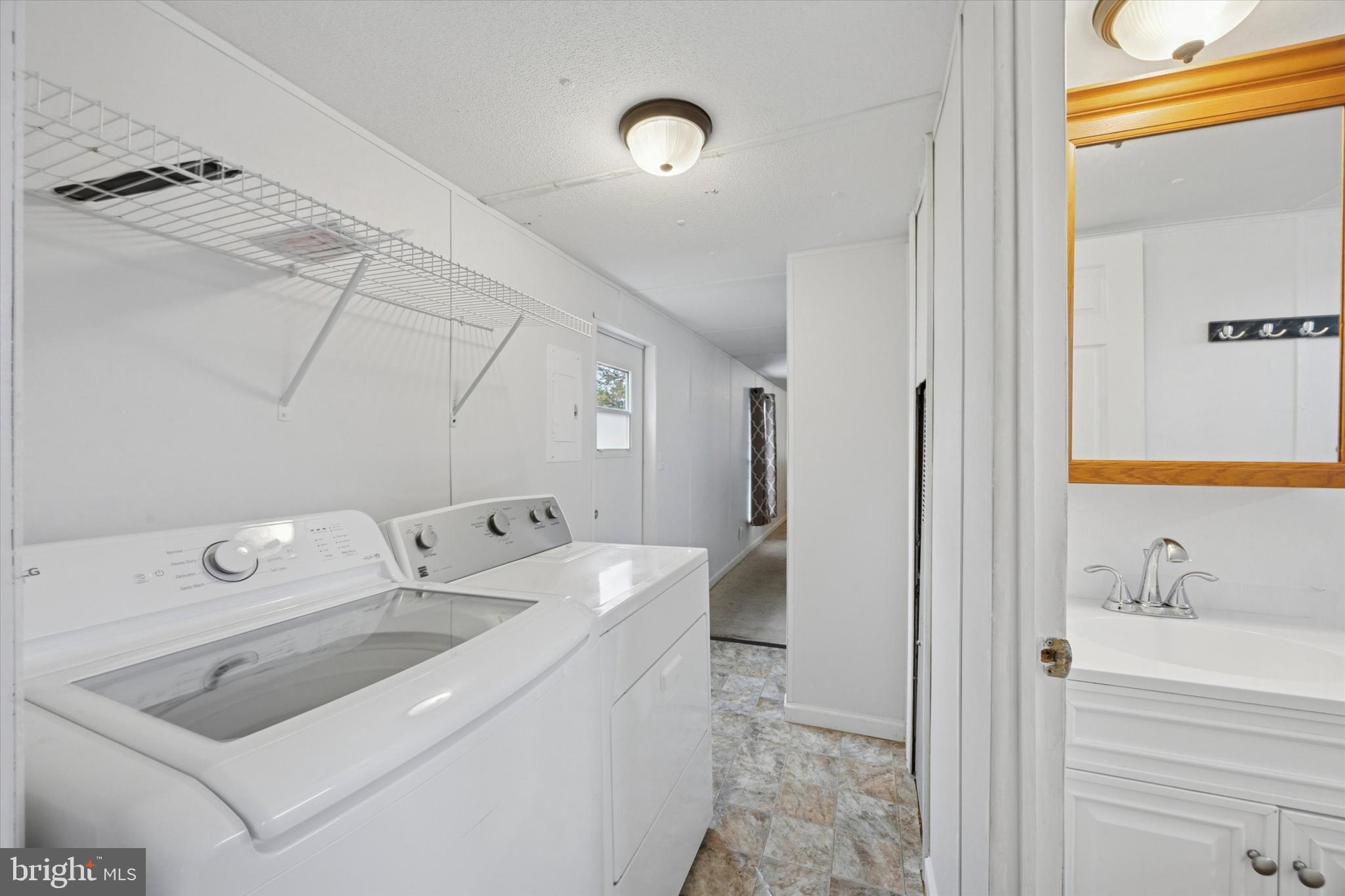 20 Winterset Road Wilmington, DE 19810 - Photo 6 of 14 a bathroom with a sink and a mirror
