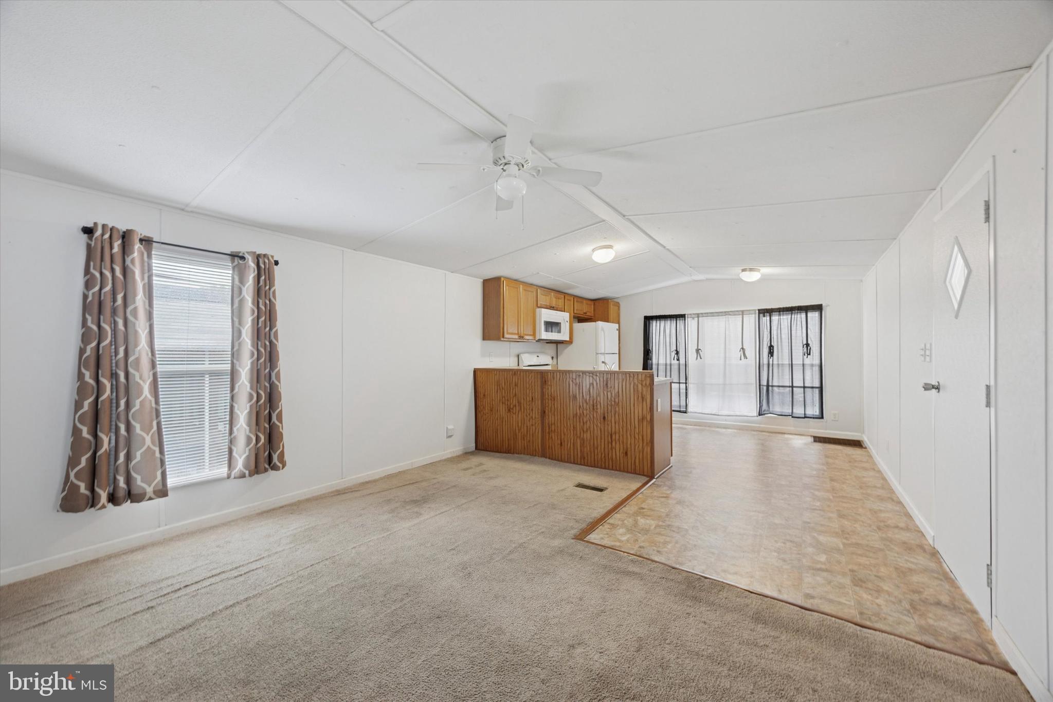 20 Winterset Road Wilmington, DE 19810 - Photo 7 of 14 an empty room with windows and cabinet