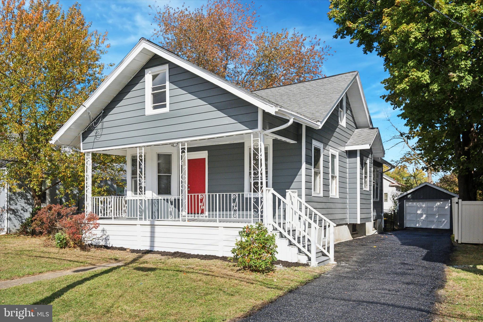260 Weber Avenue Ewing, NJ 08638 - Photo 1 of 25 a front view of a house with a yard