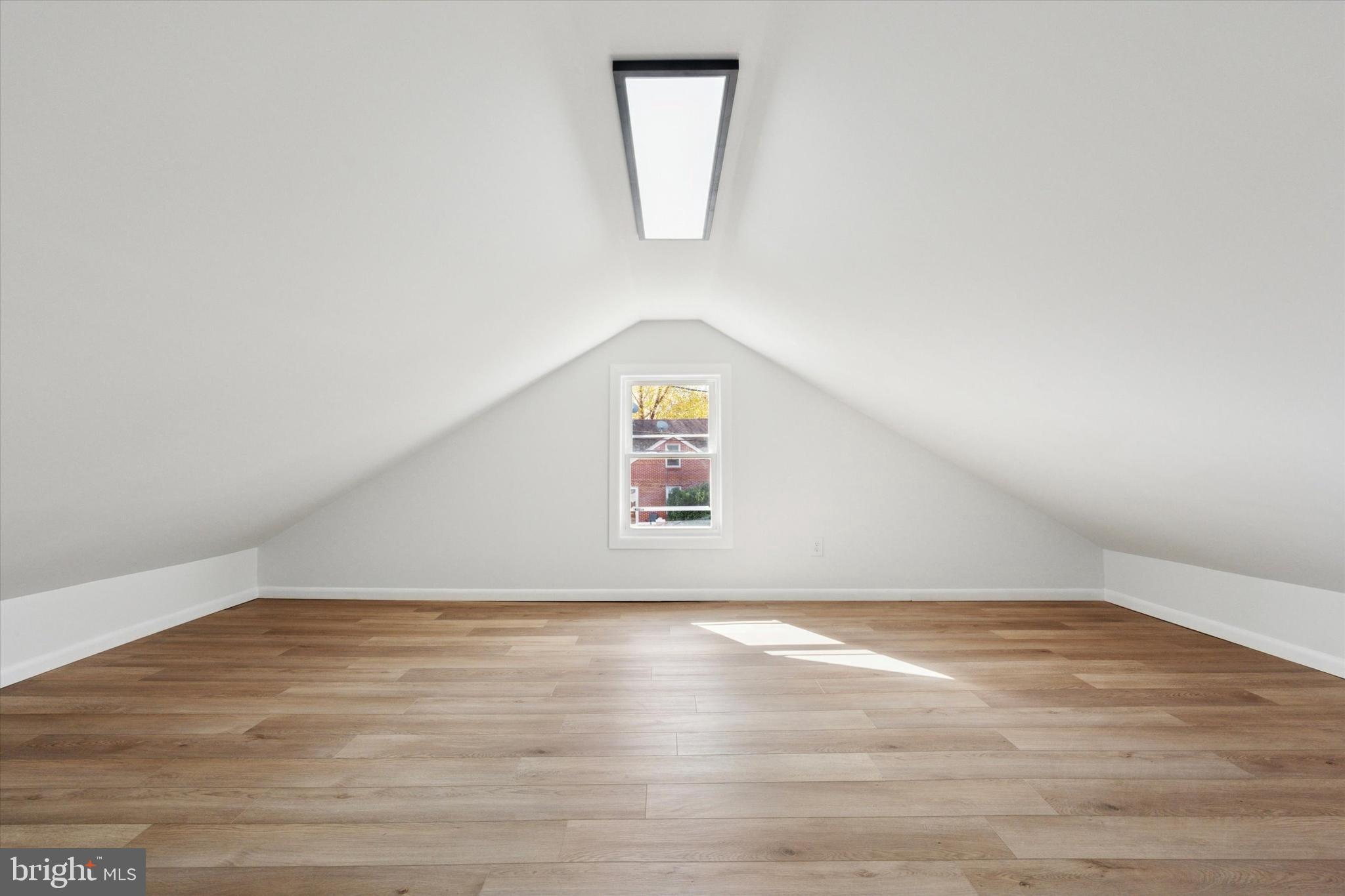 260 Weber Avenue Ewing, NJ 08638 - Photo 20 of 25 an empty room with wooden floor and windows
