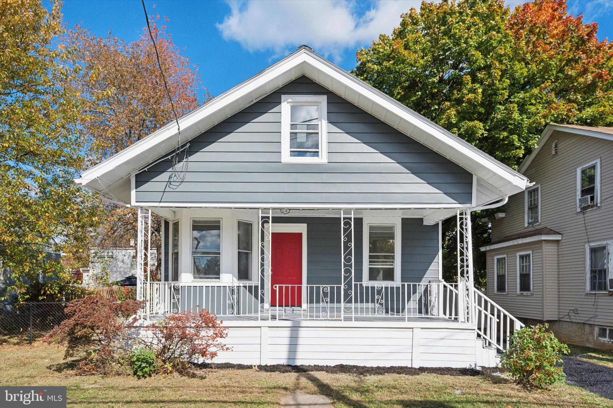 260 Weber Avenue Ewing, NJ 08638 - Photo 2 of 25 a front view of a house with a garden