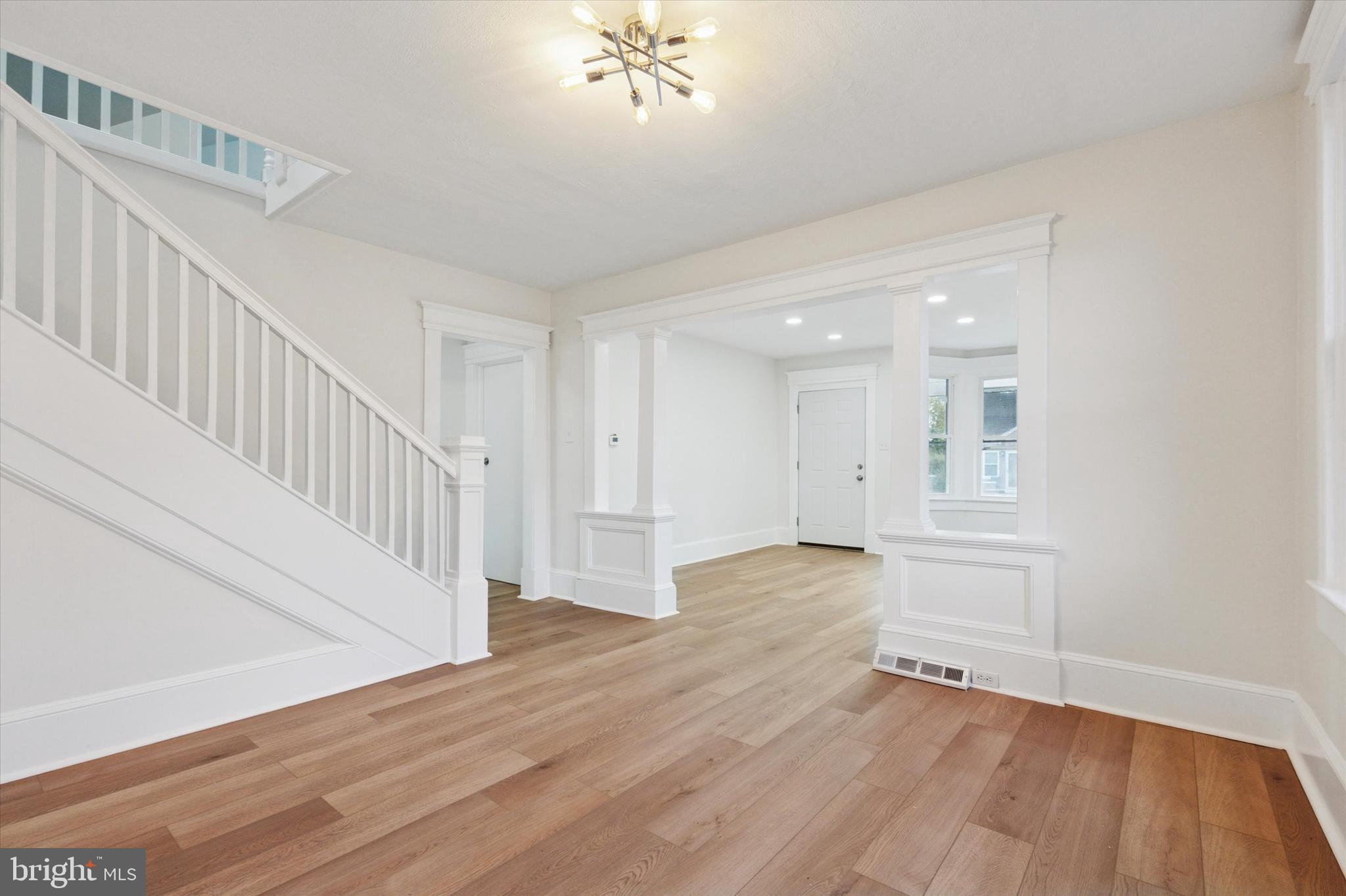 260 Weber Avenue Ewing, NJ 08638 - Photo 8 of 25 a view of an empty room with wooden floor and a window