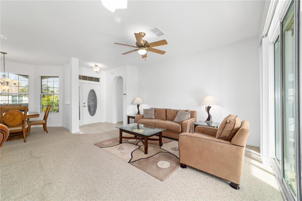 8404 Southwest 82nd Circle Ocala, FL 34481 - Photo 15 of 58 a living room with furniture and a window