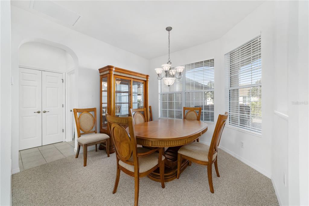 8404 Southwest 82nd Circle Ocala, FL 34481 - Photo 19 of 58 a view of a dining room with furniture window and outside view