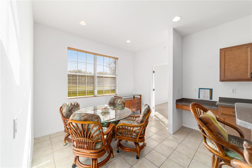 8404 Southwest 82nd Circle Ocala, FL 34481 - Photo 26 of 58 a dining room with furniture and window