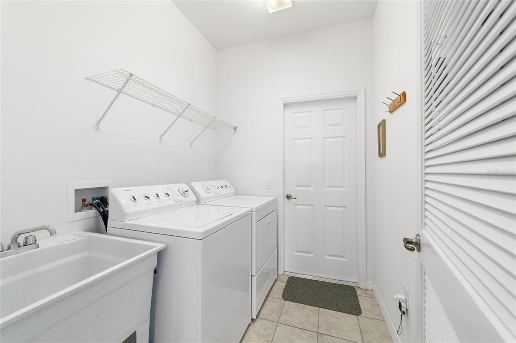 8404 Southwest 82nd Circle Ocala, FL 34481 - Photo 49 of 58 a utility room with dryer and washer