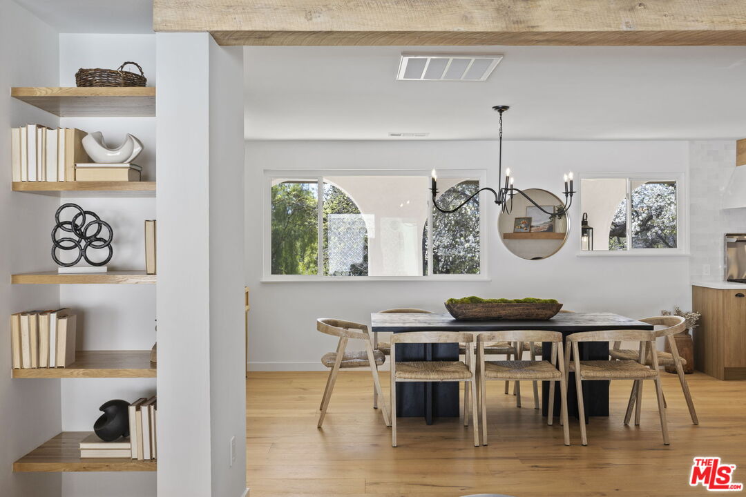 431 Montana Circle Ojai, CA 93023 - Photo 11 of 73 a view of a dining room with furniture and wooden floor