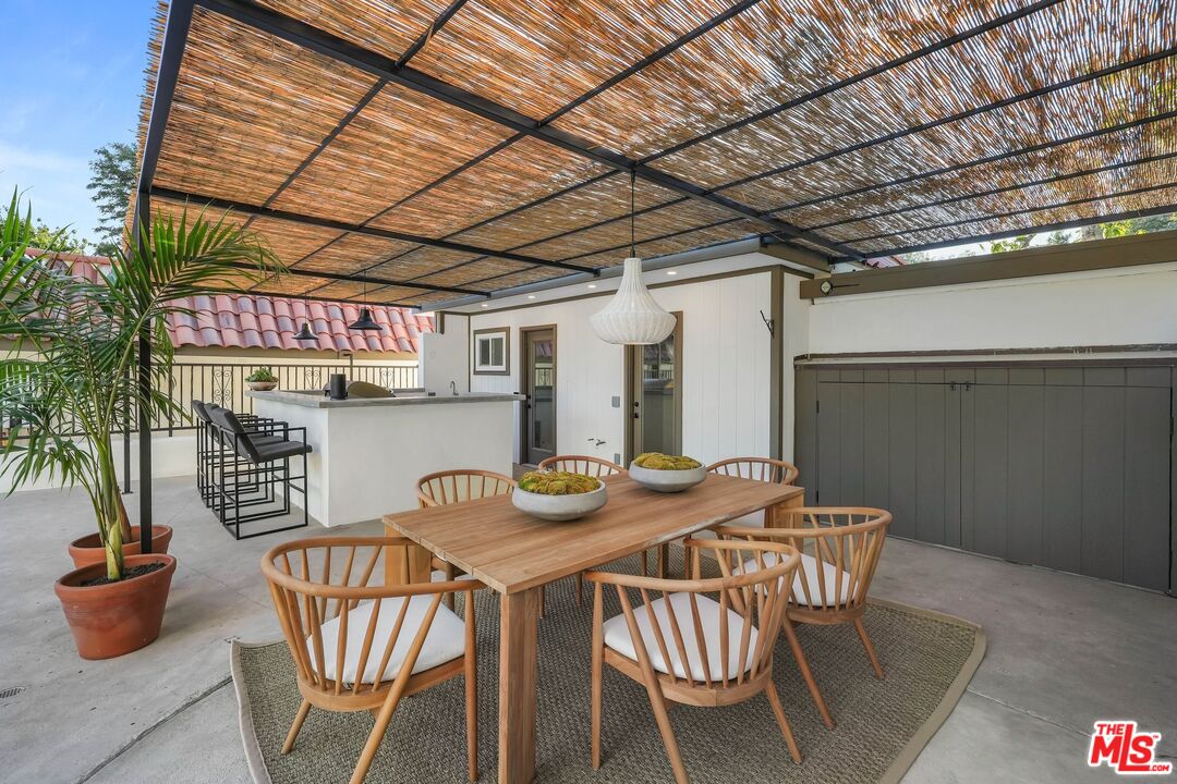 431 Montana Circle Ojai, CA 93023 - Photo 23 of 73 a table and chairs in front of a building