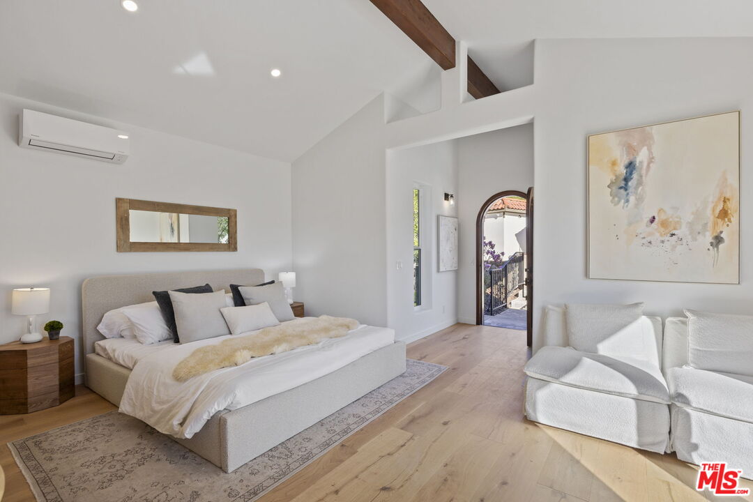 431 Montana Circle Ojai, CA 93023 - Photo 47 of 73 a spacious bedroom with a bed and glass walk in closet