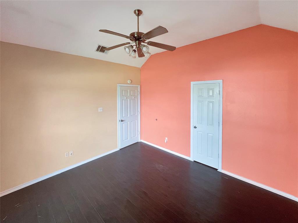 3661 Emo Street Midlothian, TX 76065 - Photo 20 of 24 a view of a big room with a ceiling fan and entryway
