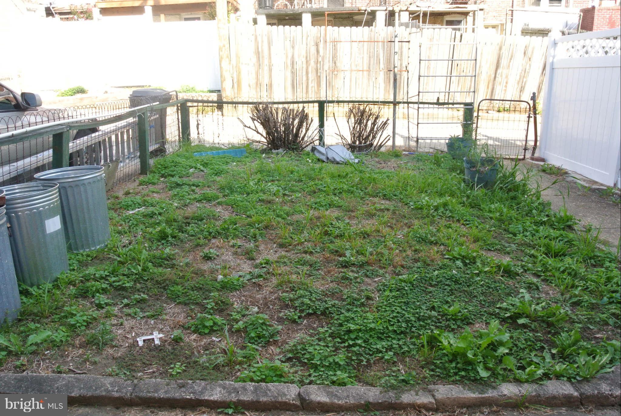 9 North Wickham Road Baltimore, MD 21229 - Photo 14 of 16 Fenced rear yard