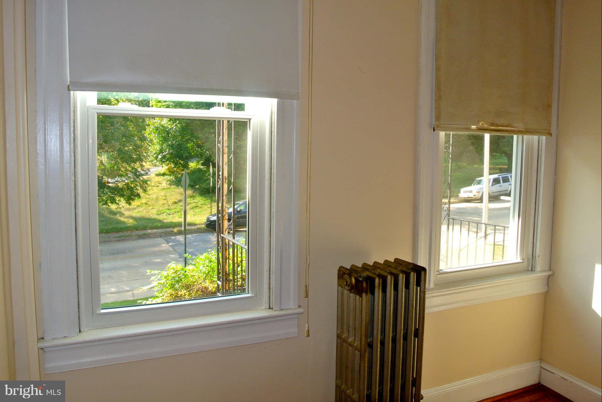 9 North Wickham Road Baltimore, MD 21229 - Photo 5 of 16 new windows throughout entire home!