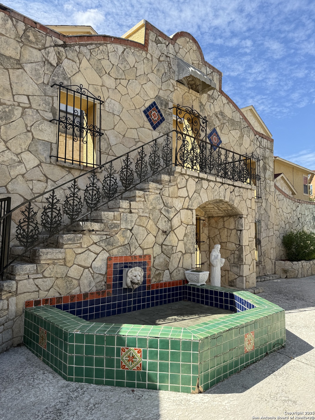 6160 Eckhert Road, Unit 204 San Antonio, TX 78240 - Photo 25 of 30 a view of a building with a garden