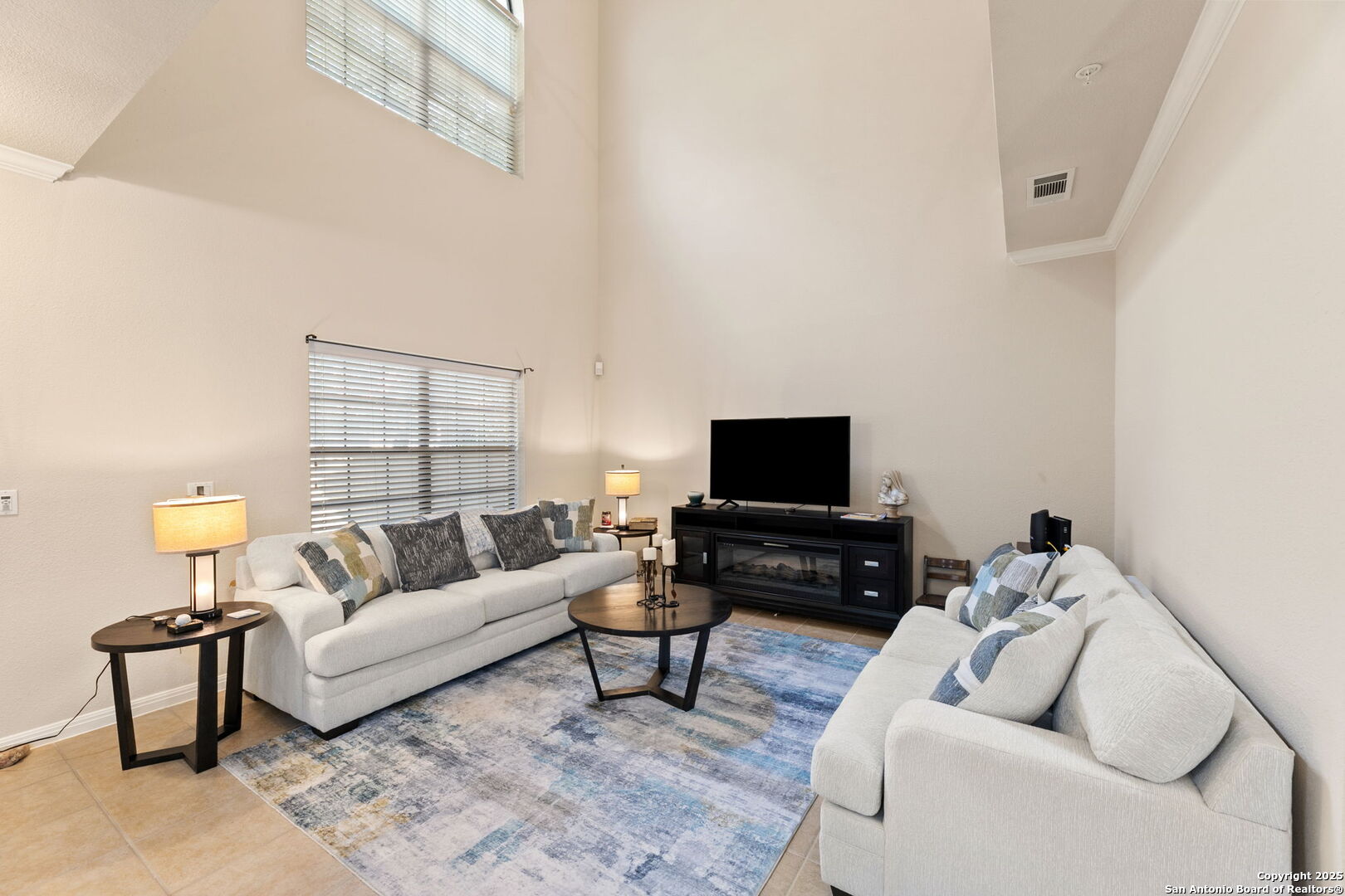 6160 Eckhert Road, Unit 204 San Antonio, TX 78240 - Photo 4 of 30 a living room with furniture and a flat screen tv