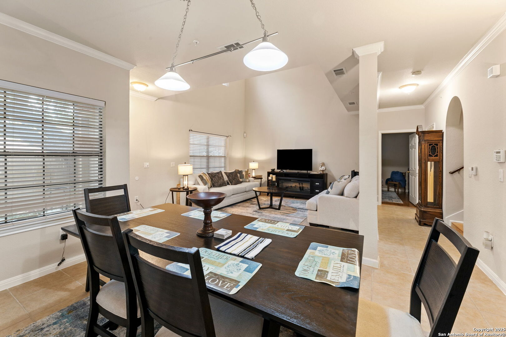 6160 Eckhert Road, Unit 204 San Antonio, TX 78240 - Photo 10 of 30 a living room with furniture a flat screen tv and a window