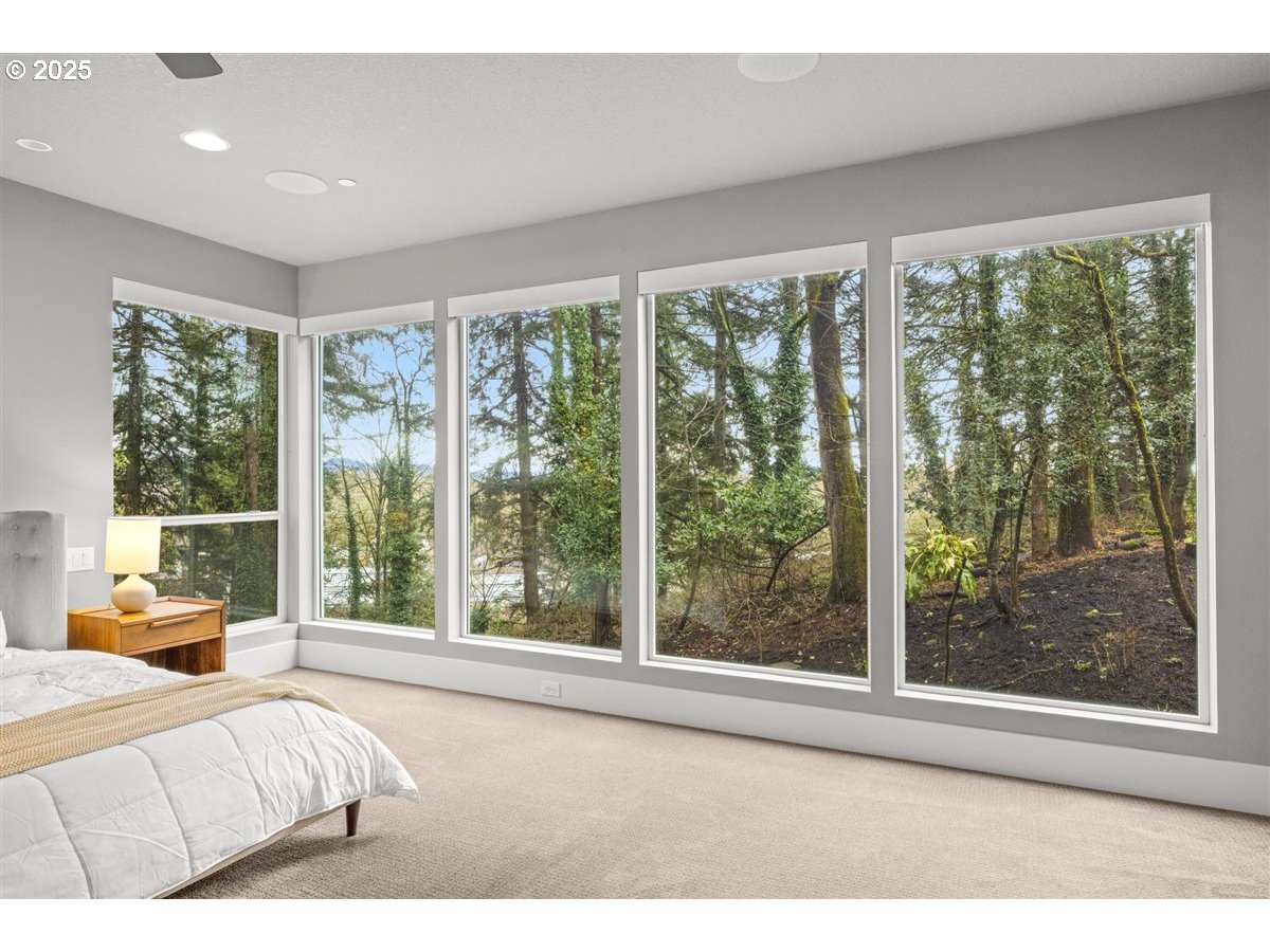 2193 Northeast 3rd Avenue Camas, WA 98607 - Photo 18 of 35 a bedroom with a large window and a bed