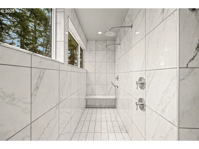 a bathroom with a sink and a shower