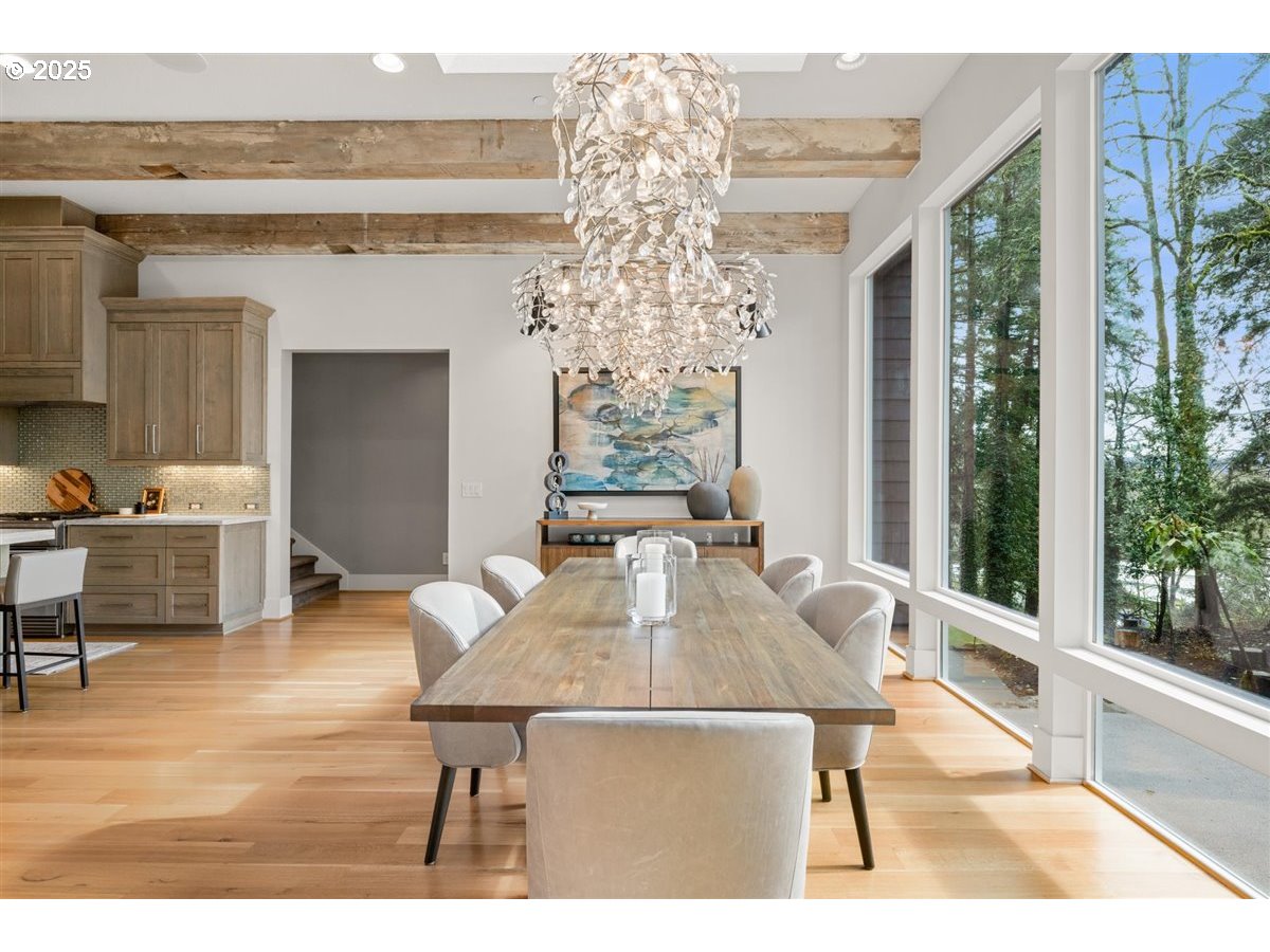 2193 Northeast 3rd Avenue Camas, WA 98607 - Photo 9 of 35 a living room with furniture a large window and wooden floor