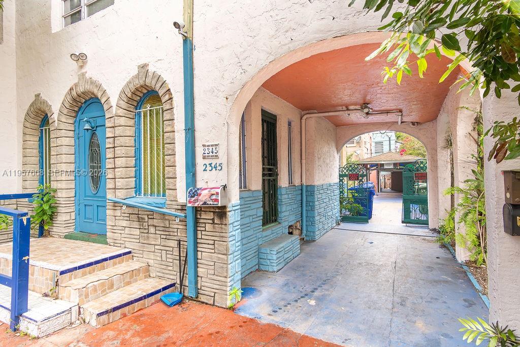 2345 Southwest 19th Street Miami, FL 33145 - Photo 14 of 21 a view of a house with a porch