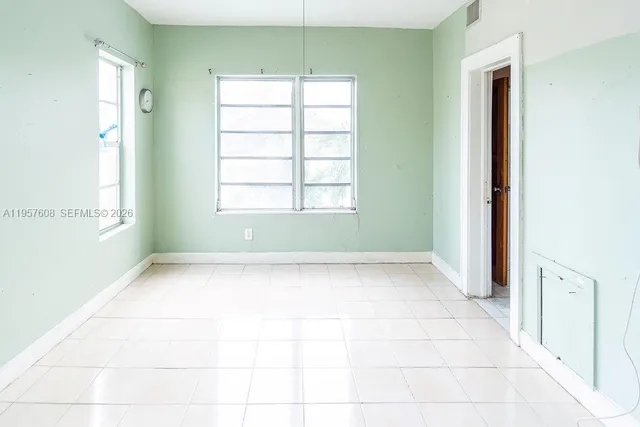 a bathroom with a bathtub toilet and sink