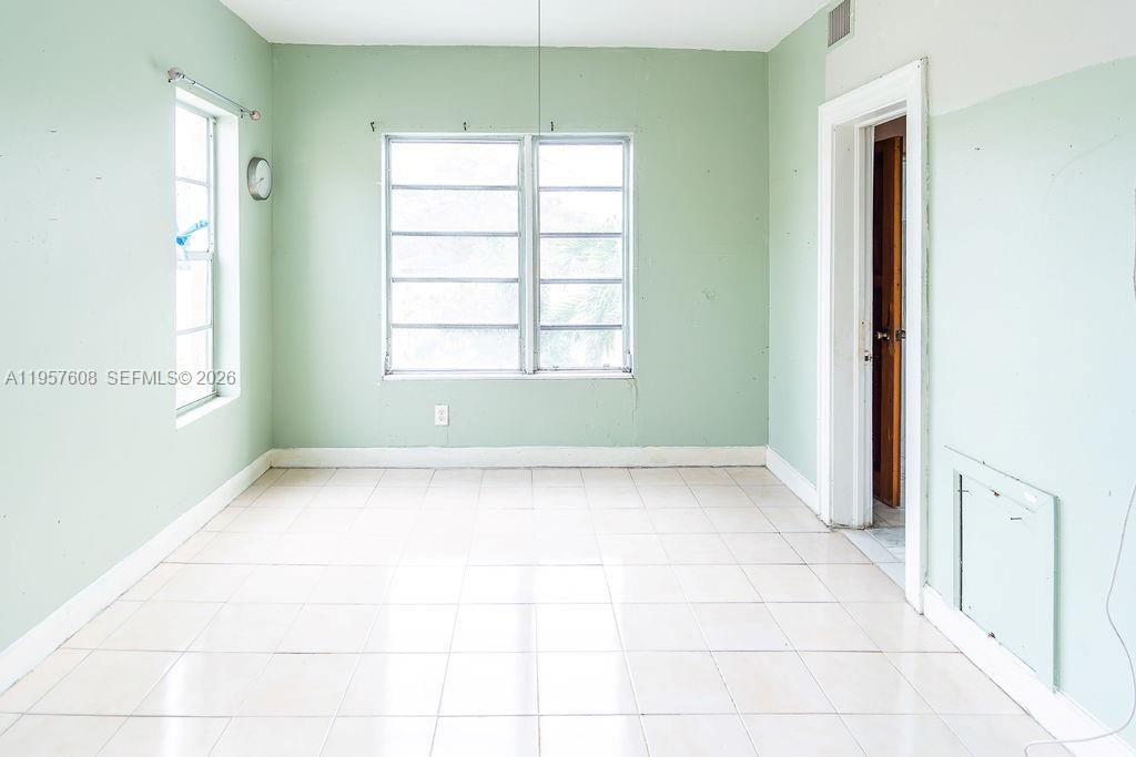 2345 Southwest 19th Street Miami, FL 33145 - Photo 17 of 21 a view of an empty room with a window
