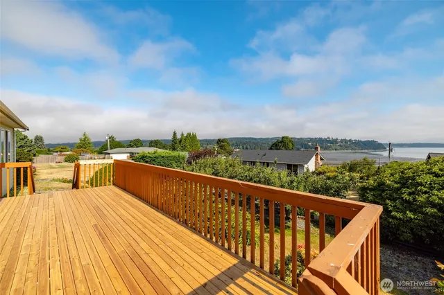 a view of balcony with furniture