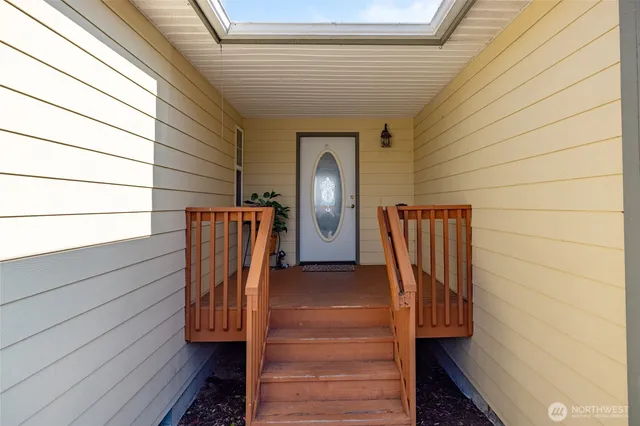 a view of entryway with wooden floor