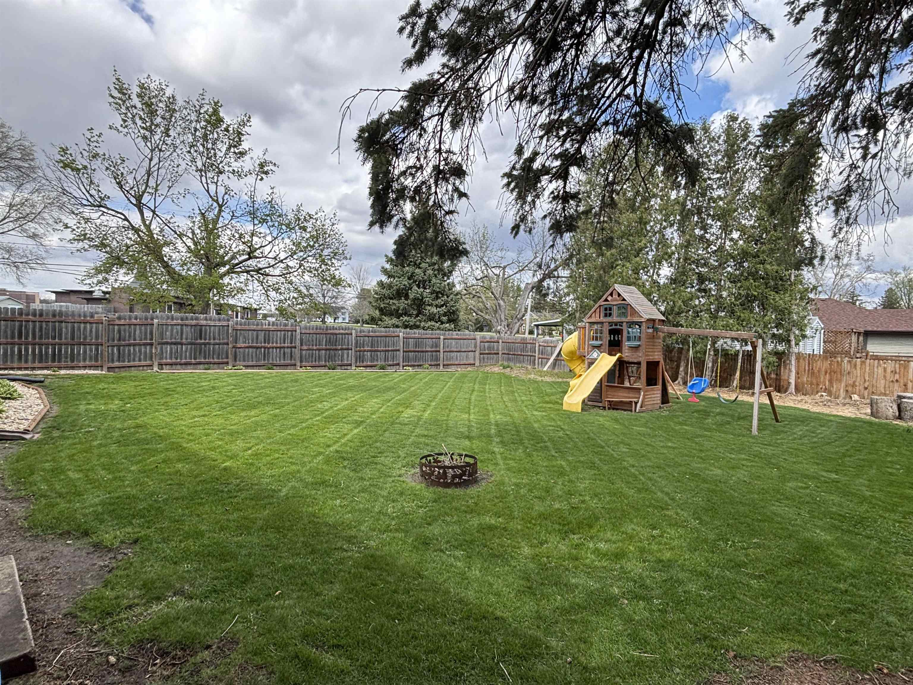 732 West 2nd Street Byron, IL 61010 - Photo 5 of 22 a view of a house with a backyard
