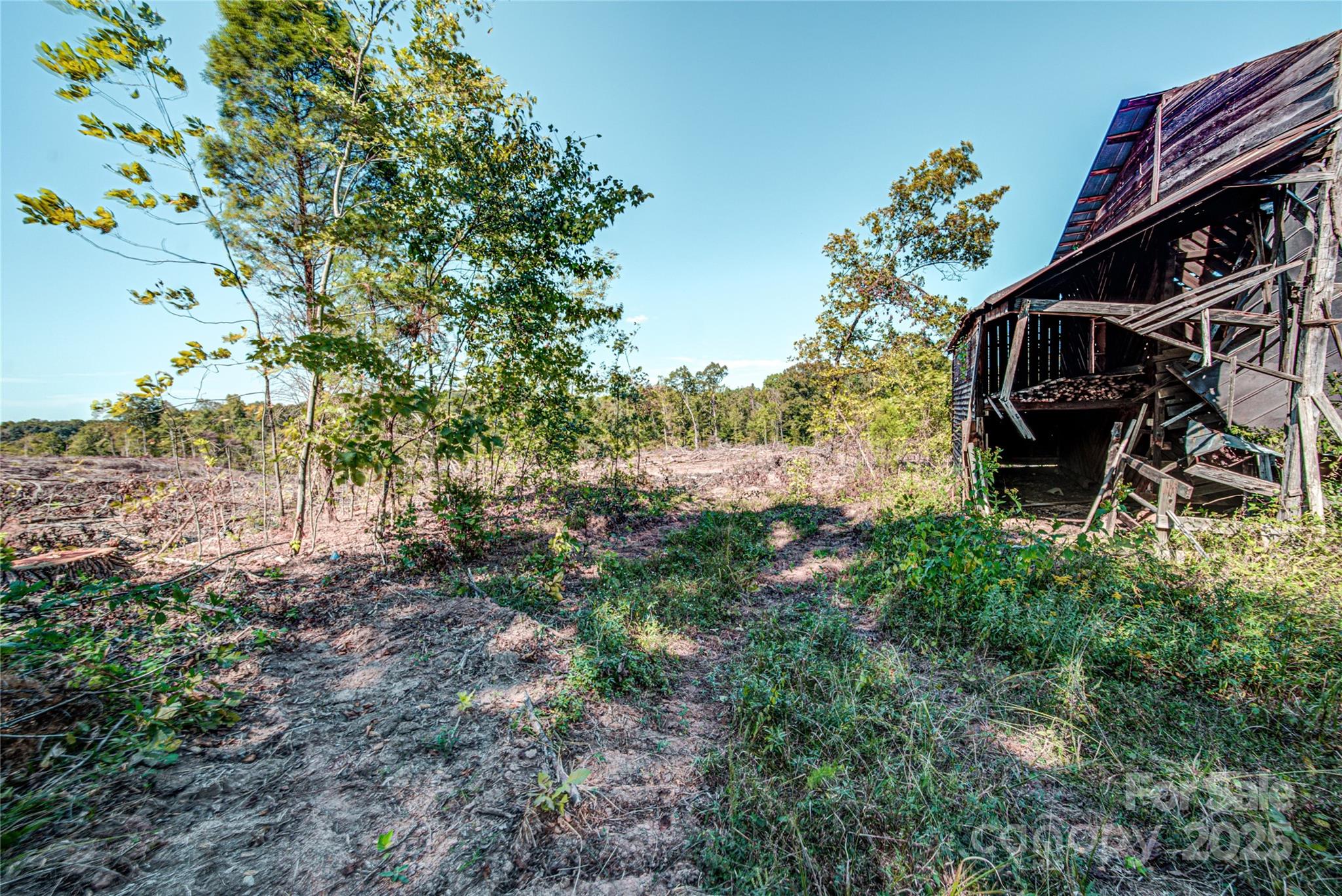 0 Carriage Road Statesville, NC 28677 - Photo 9 of 11 a backyard of a house with lots of green space